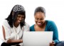 Two Girls Typing